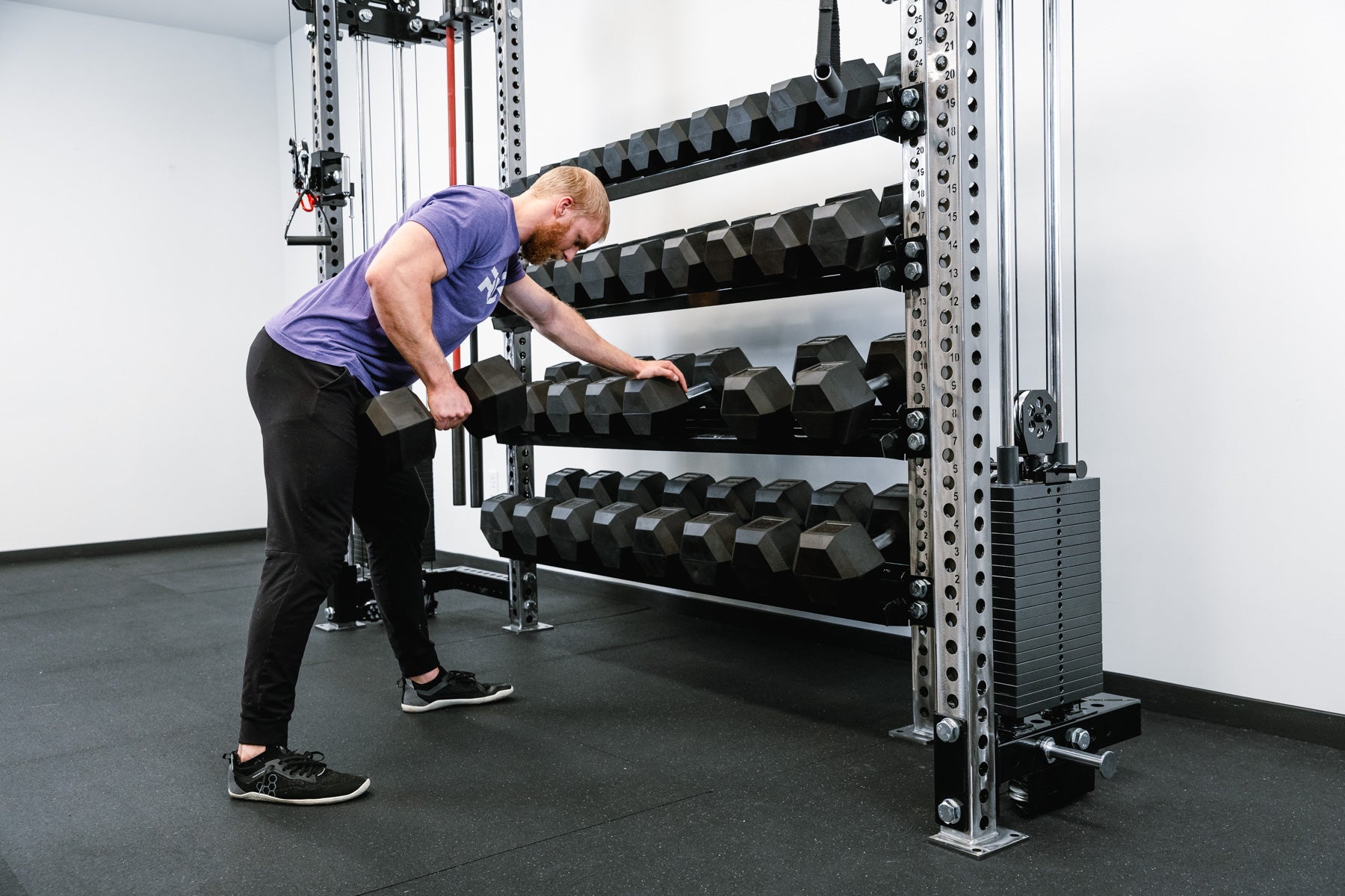 Dumbbell & Kettlebell Shelves being used for dumbbell storage in the Functional Trainer with storage configuration