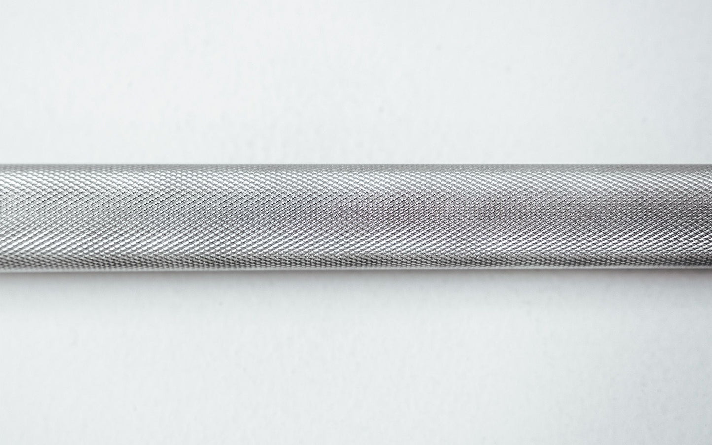 Close Up of Knurling Texture on the 48'' Solid Lat Bar from Rep Fitness UK | Shop Best Premium Gym Equipment for Home & Commercial Use Online